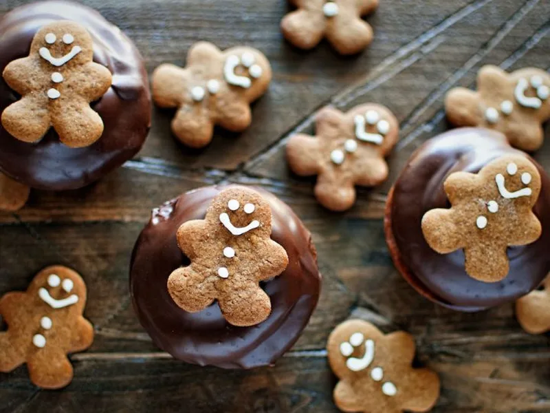Chocolate Dipped Gingerbread Cupcakes with Orange Swiss Meringue