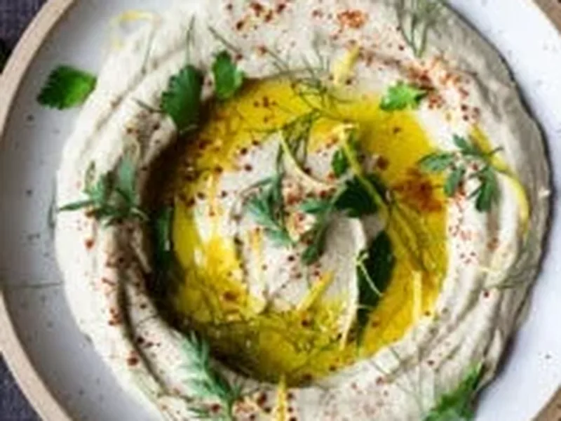 Lemony Artichoke White Bean Dip with Tahini and Herbs