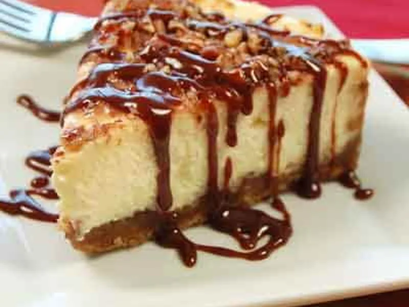 Praline Cheesecake with Hot Fudge Caramel Sauce