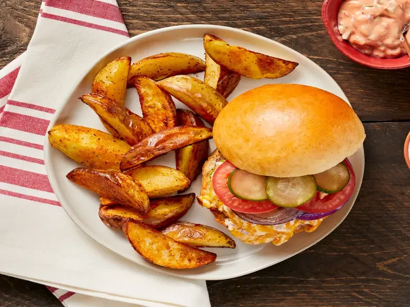 Creamy Cheddar Cheeseburgers with Roasted Potato Wedges