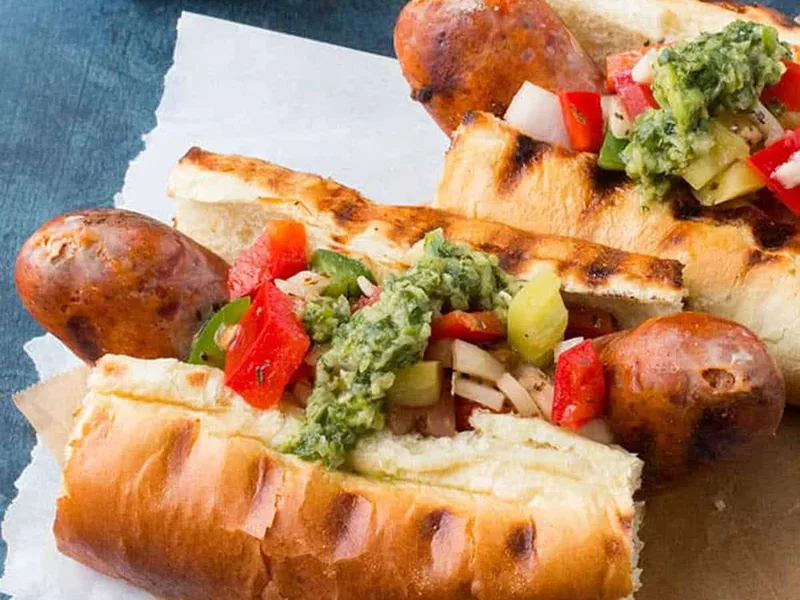 Grilled Chorizo Choripan with Chimichurri and Salsa Criolla
