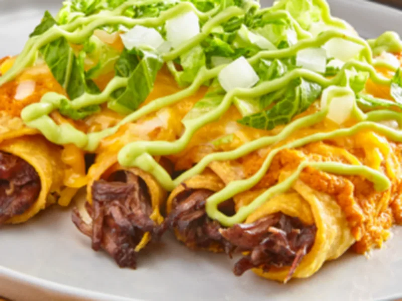 Crunchy Beef Tacos Ahogados with Avocado Crema