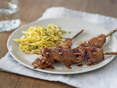Grilled Pork BBQ Skewers with Tangy Green Mango Slaw