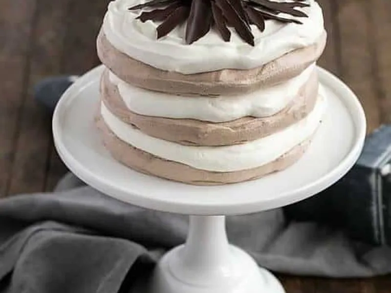 Layered Chocolate Meringue Cake with Whipped Cream