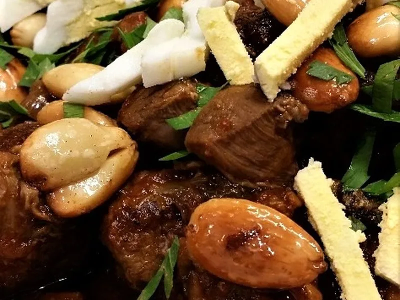 Moroccan Lamb Stew with Almonds and Raisins