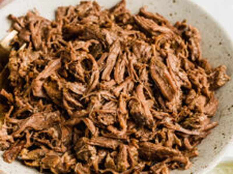 Easy Slow Cooker Shredded Chuck Roast for Tacos and Rice