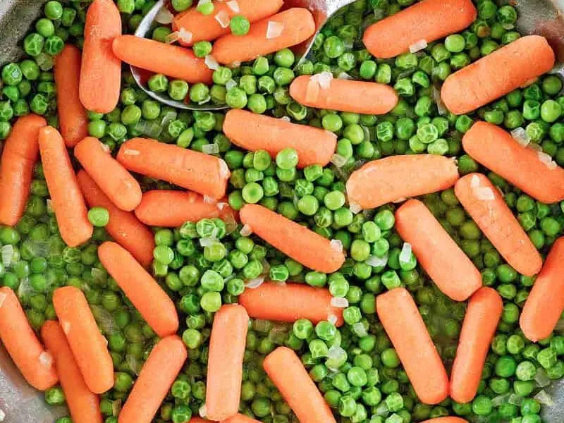 Buttery Sautéed Peas and Carrots with Onion