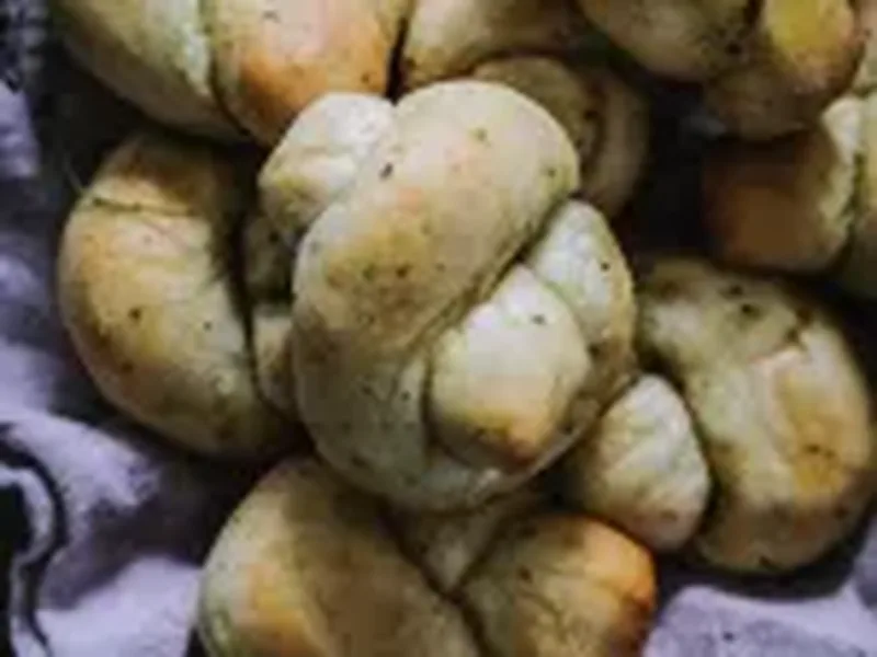 Soft Buttery Homemade Garlic Knots with Fresh Herbs