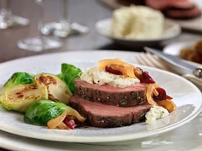 Herb-Crusted Beef Tenderloin with Wine-Braised Onions