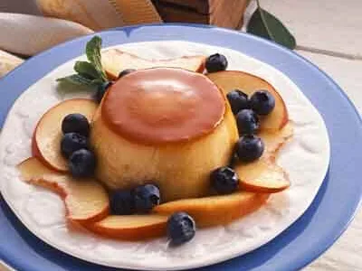Orange Blueberry Flan with Caramel and Fresh Peaches