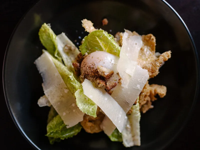Chicken Caesar Salad with Schmaltz Dressing and Poached Egg
