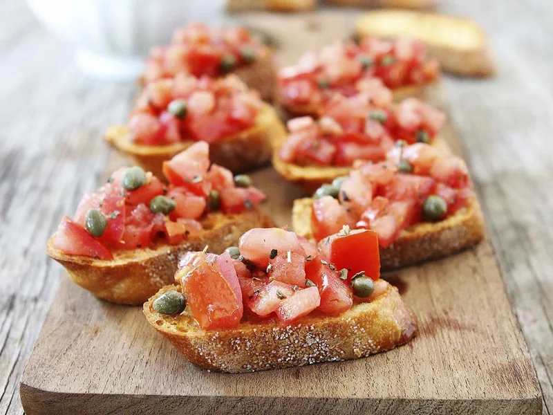 Tomato Caper Bruschetta with Crispy Garlic Bread