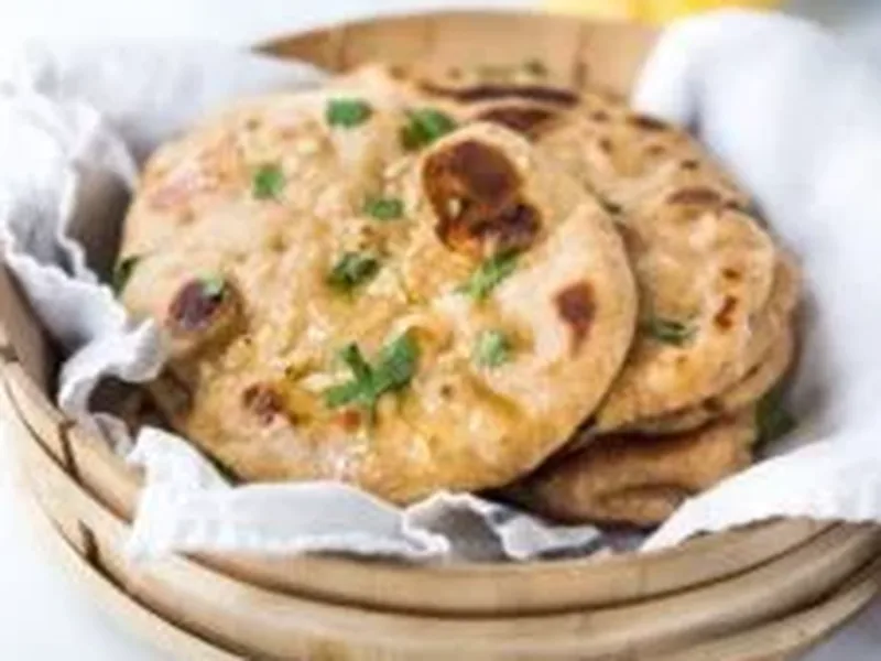 Homemade Indian-Style Naan Bread with Yogurt and Seeds