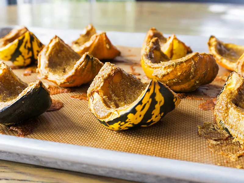 Roasted Acorn Squash with Ras el Hanout Seed Paste