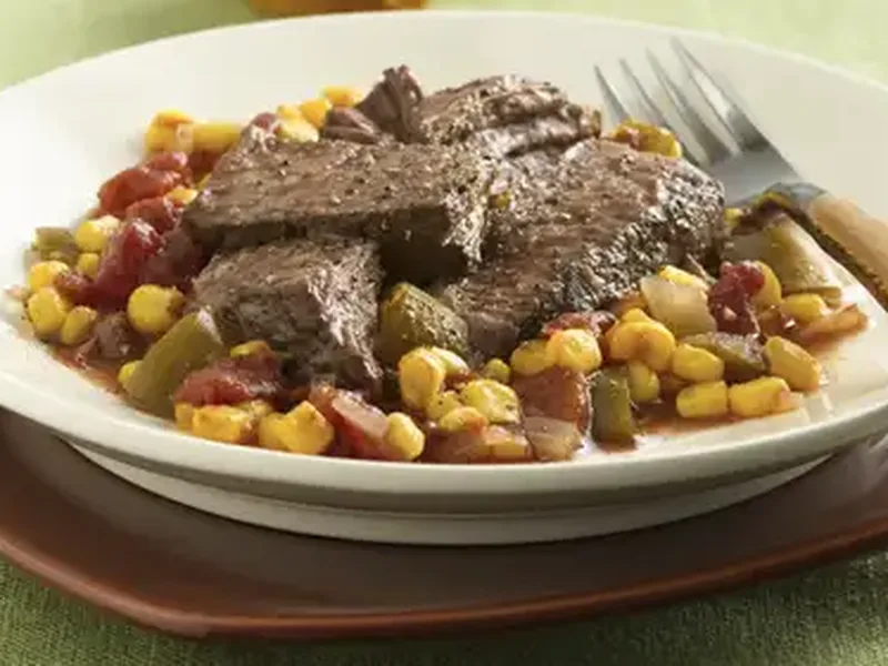 Slow Cooker Cajun Pot Roast with Maque Choux Vegetables