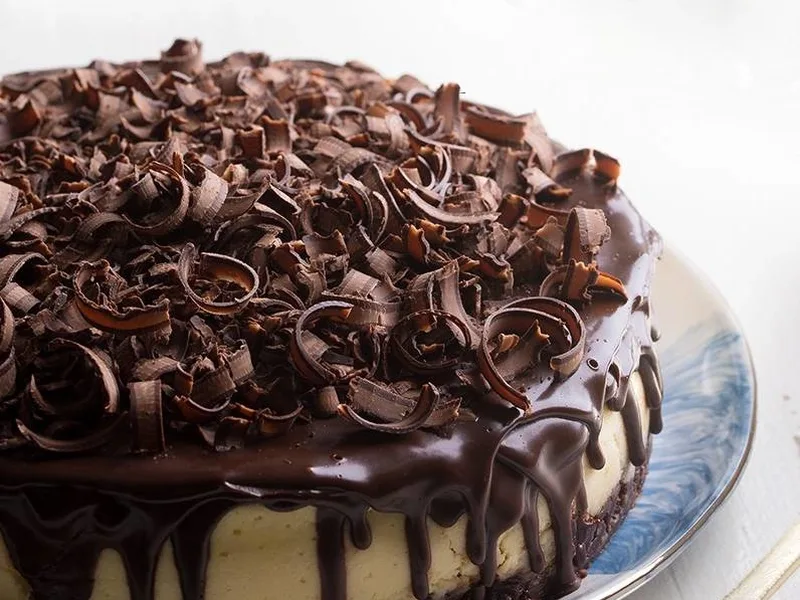 New York Style Cheesecake with Brownie Base and Chocolate Ganache