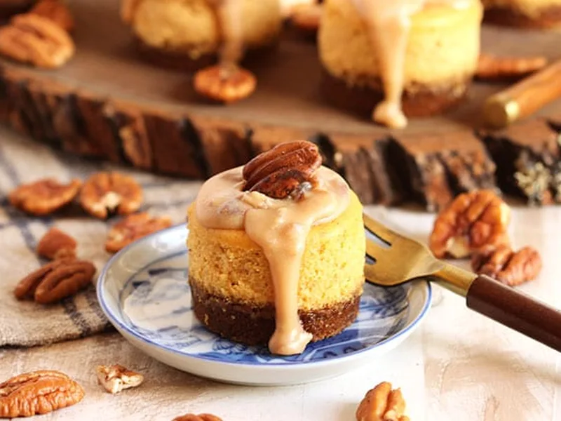 Mini Bourbon Pumpkin Praline Cheesecakes with Gingersnap Crust