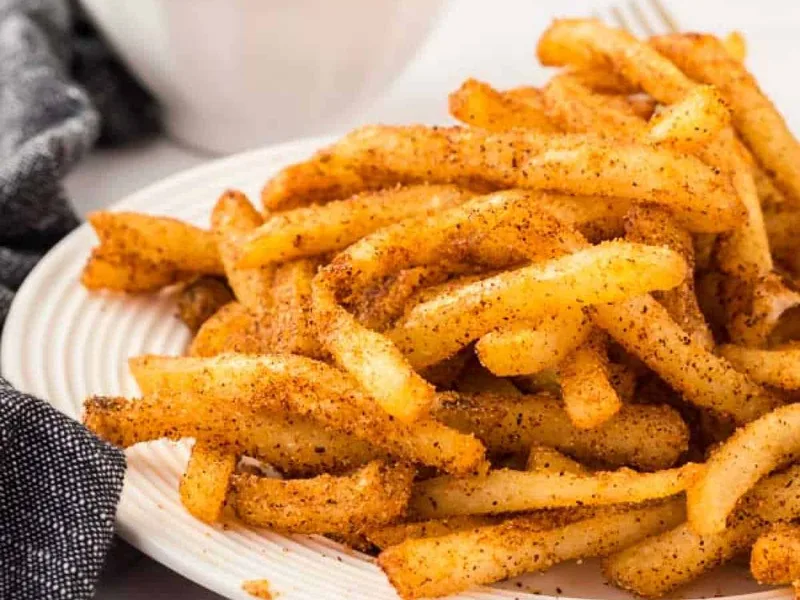 Crispy Seasoned Nacho Fries with Cheese Sauce