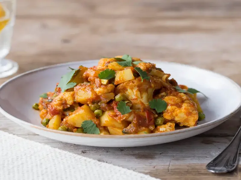 Curried Cauliflower and Potatoes with Green Peas