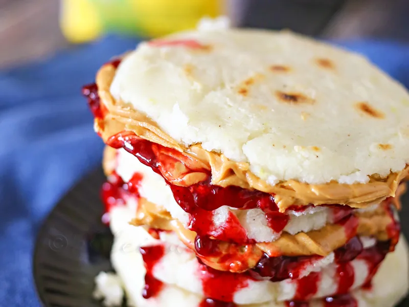 Golden Peanut Butter Jelly Stuffed Cornmeal Arepas