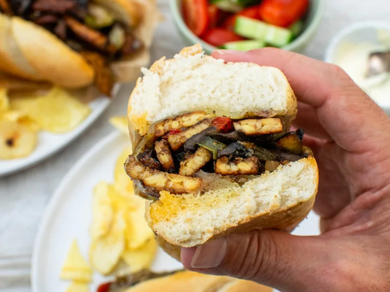 Crispy Tempeh Cheesesteak with Caramelized Vegetables