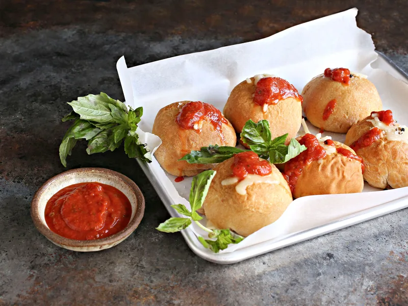 Cheesy Meatball Sliders Wrapped in Biscuit Dough