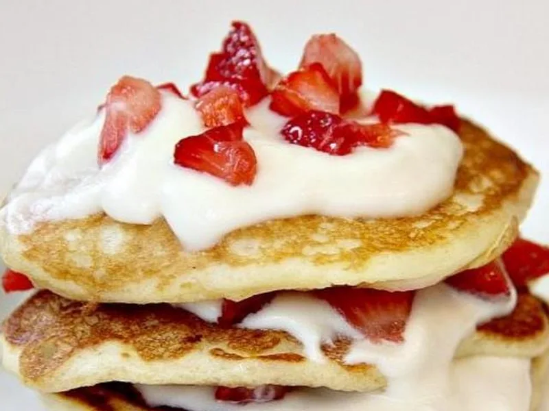 Three Layer Strawberry Pancakes with Fresh Berries and Cream