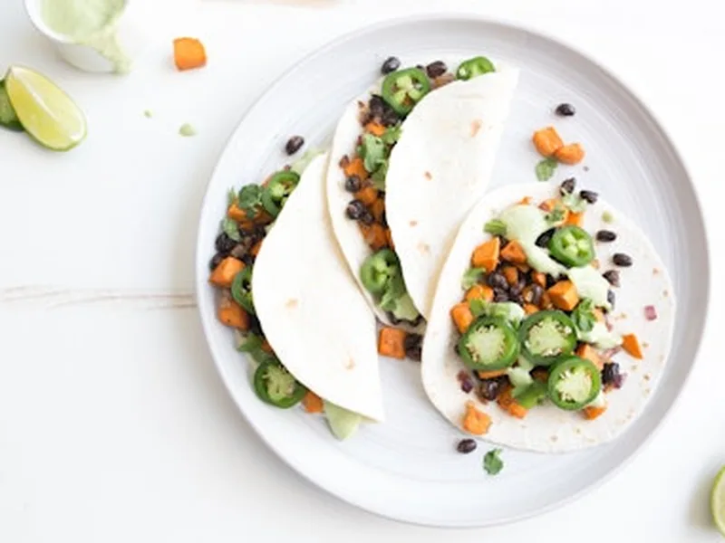 Ground Turkey and Sweet Potato Taco Salad with Avocado Crema