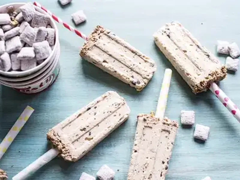 No-Bake Muddy Buddies Cheesecake Pops with Crunchy Topping