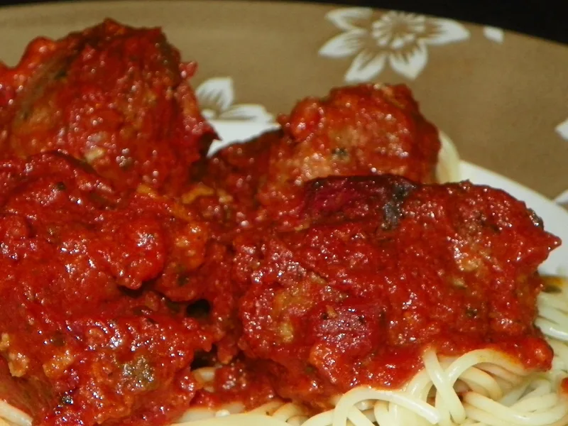Herb-Crusted Beef and Veal Meatballs with Cheese Core