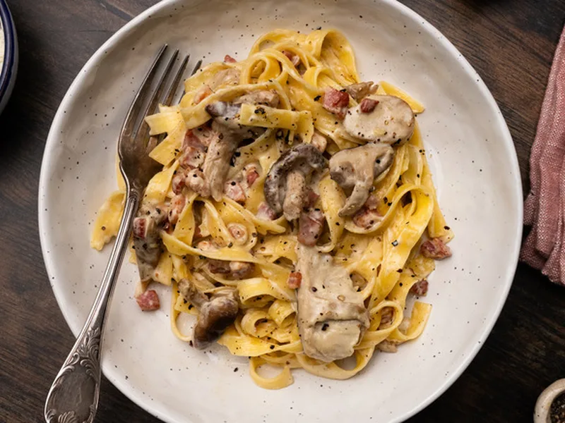 Pancetta and Mushroom Tagliatelle with Creamy Parmesan Sauce