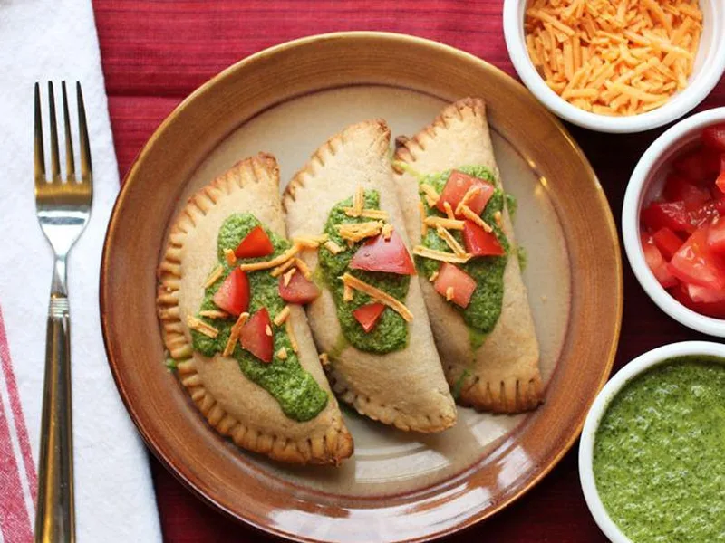 Crispy Baked Vegan Empanadas with Jalapeno Lime Sauce