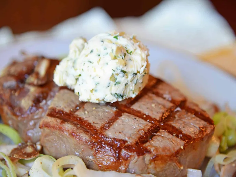 Grilled Filet Mignon with Brandy Garlic Butter and Sautéed Leeks