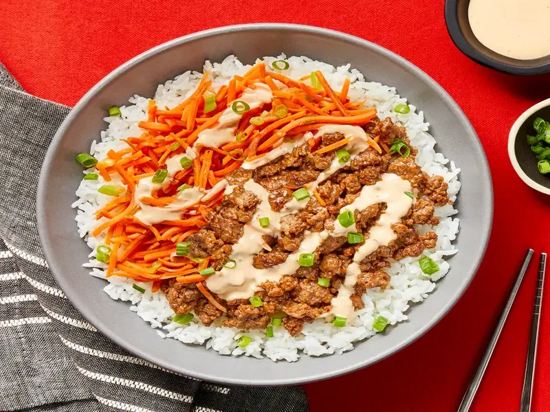 Sesame Soy Beef Bowls with Shredded Carrots and Sriracha Mayo