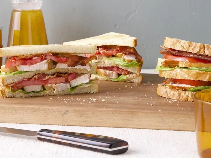 Crispy Chicken Caesar Club Sandwich with Bacon and Parmesan