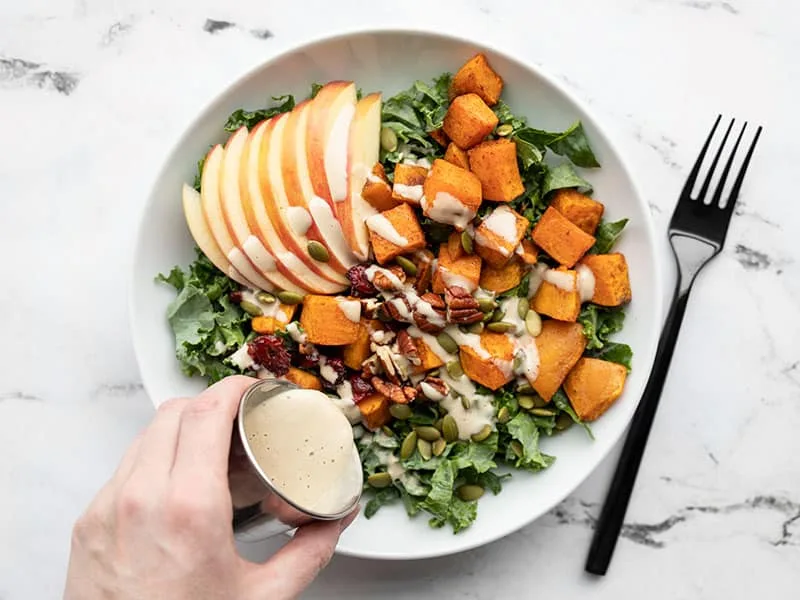 Roasted Sweet Potato and Kale Salad with Tahini Dressing