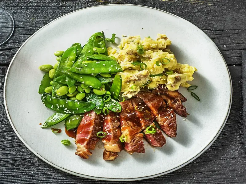 Hoisin Glazed Sirloin Steak with Snow Peas and Scallion Potatoes