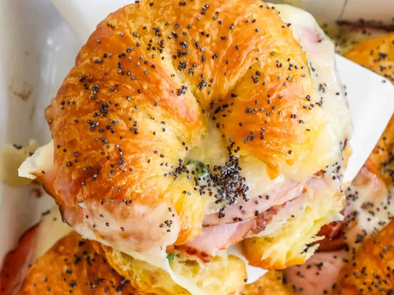 Warm Ham and Swiss Cheese Croissants with Poppy Seeds