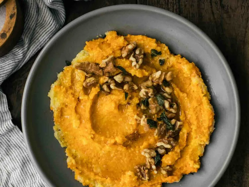 Creamy Roasted Carrot Polenta with Crispy Sage and Walnuts