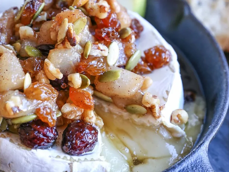 Maple Spiced Pear and Walnut Baked Brie with Cranberries