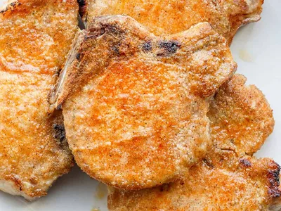 Ultimate Oven Baked Pork Chops with Apple Brine and Garlic Rub