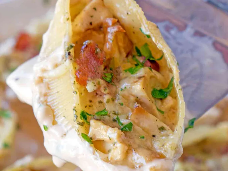 Creamy Chicken Bacon Ranch Stuffed Shells with Parmesan Sauce