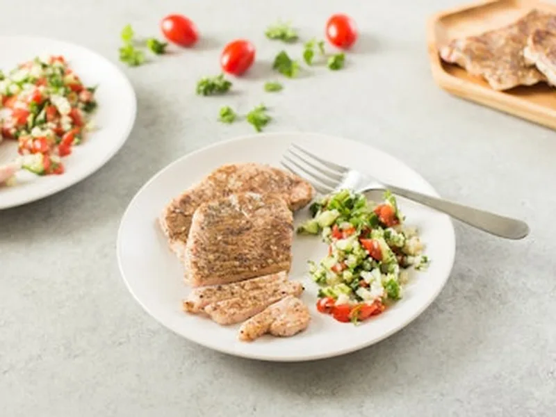 Za'atar Rubbed Pork Chops with Cauliflower Tabbouleh