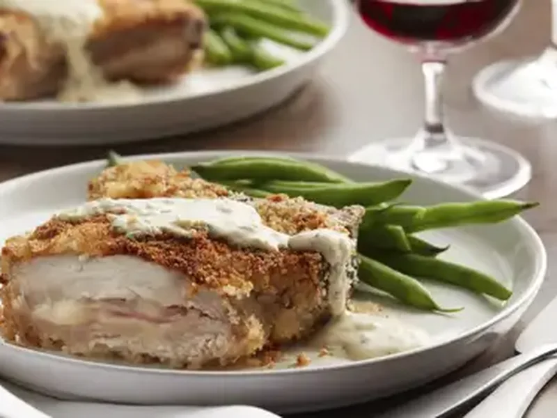 Ham and Swiss Stuffed Pork Chops with Dijon Pan Sauce