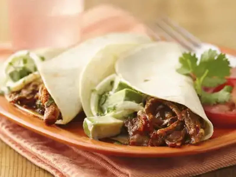 Slow-Cooker Fajita Pulled Pork Sandwiches with Avocado Slaw