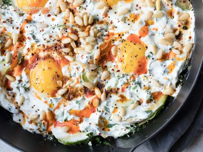 Turkish Eggs with Kale and Spiced Butter in Cast Iron Pan