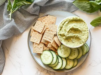 Pesto Hummus with Parmesan and Pine Nuts