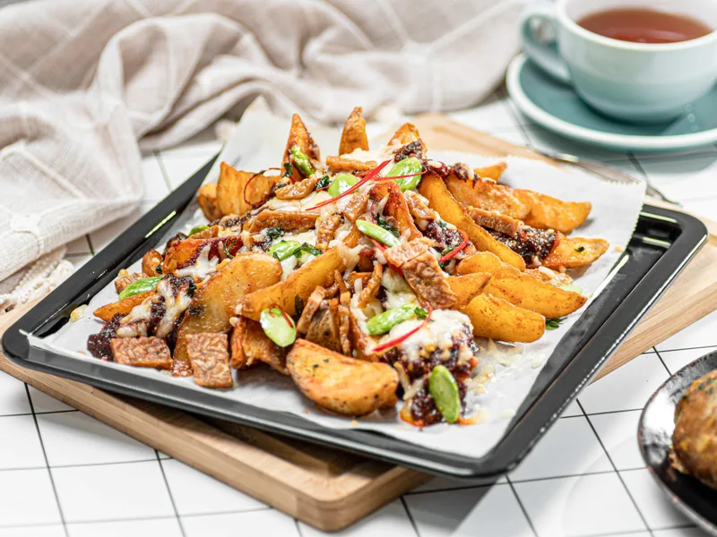 Crispy Potato Wedges with Sambal Tempeh and Melted Cheese