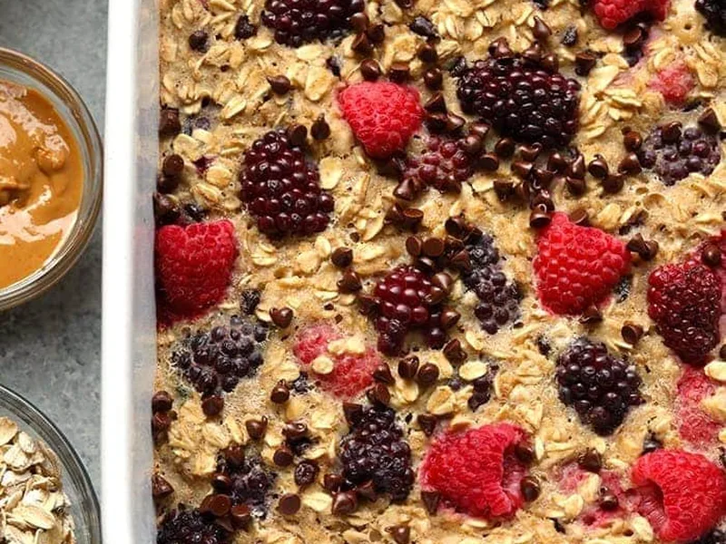 Dark Chocolate Berry Baked Oatmeal with Banana and Maple Syrup