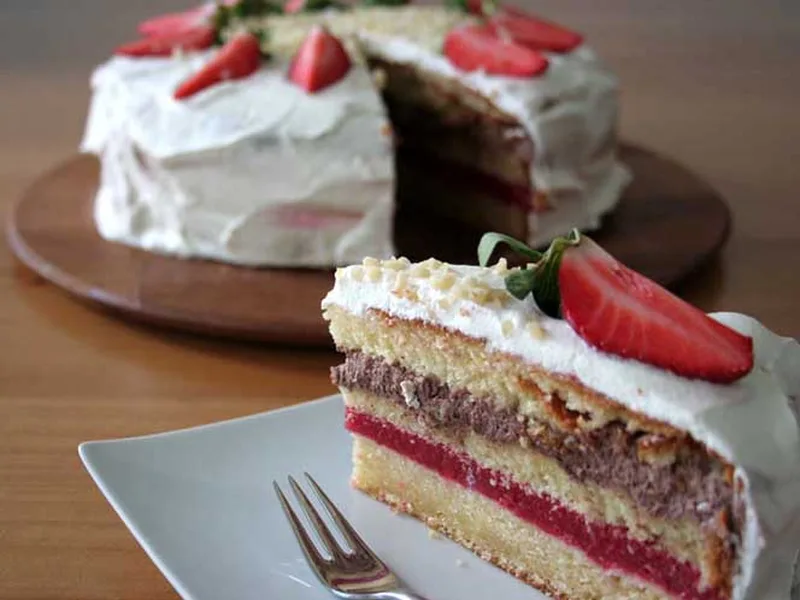 Orange Strawberry Layer Cake with Chocolate Cream and Berries
